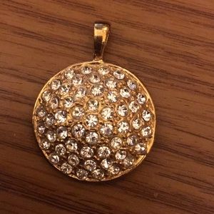 Gold tone crystal pendent